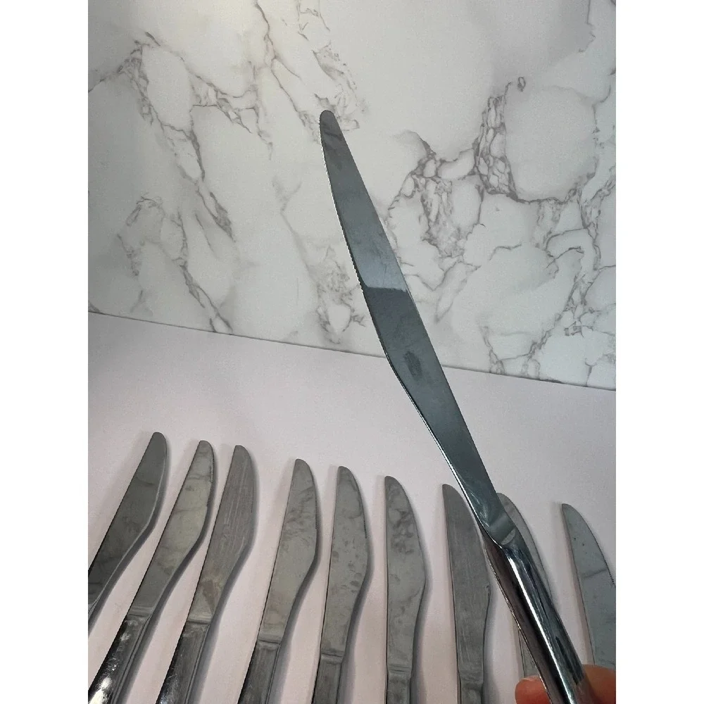 Set of 10 Oneida Apollo 18/10 Dinner Knives,‎ Pierced Circles, 9.5